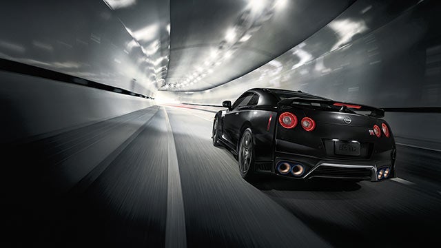 2023 Nissan GT-R seen from behind driving through a tunnel | Dave Syverson Nissan in Albert Lea MN